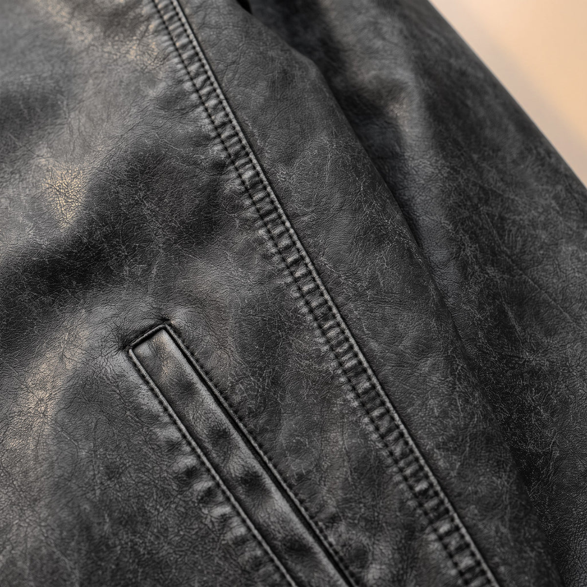 Lazaro faux leather moto jacket, Black, washed distressed faux leather finish up close
