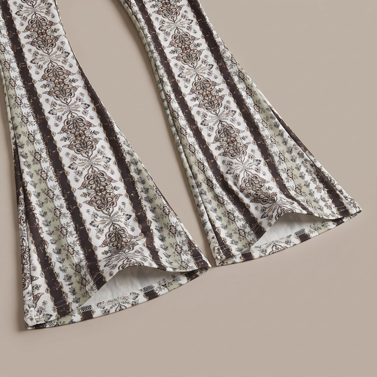 Serena flare pants, White Tribal, flared bell hem close-up