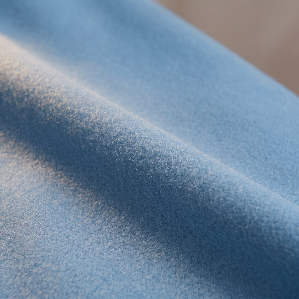 Rosalind coat, Sky Blue, wool blend cloth up close