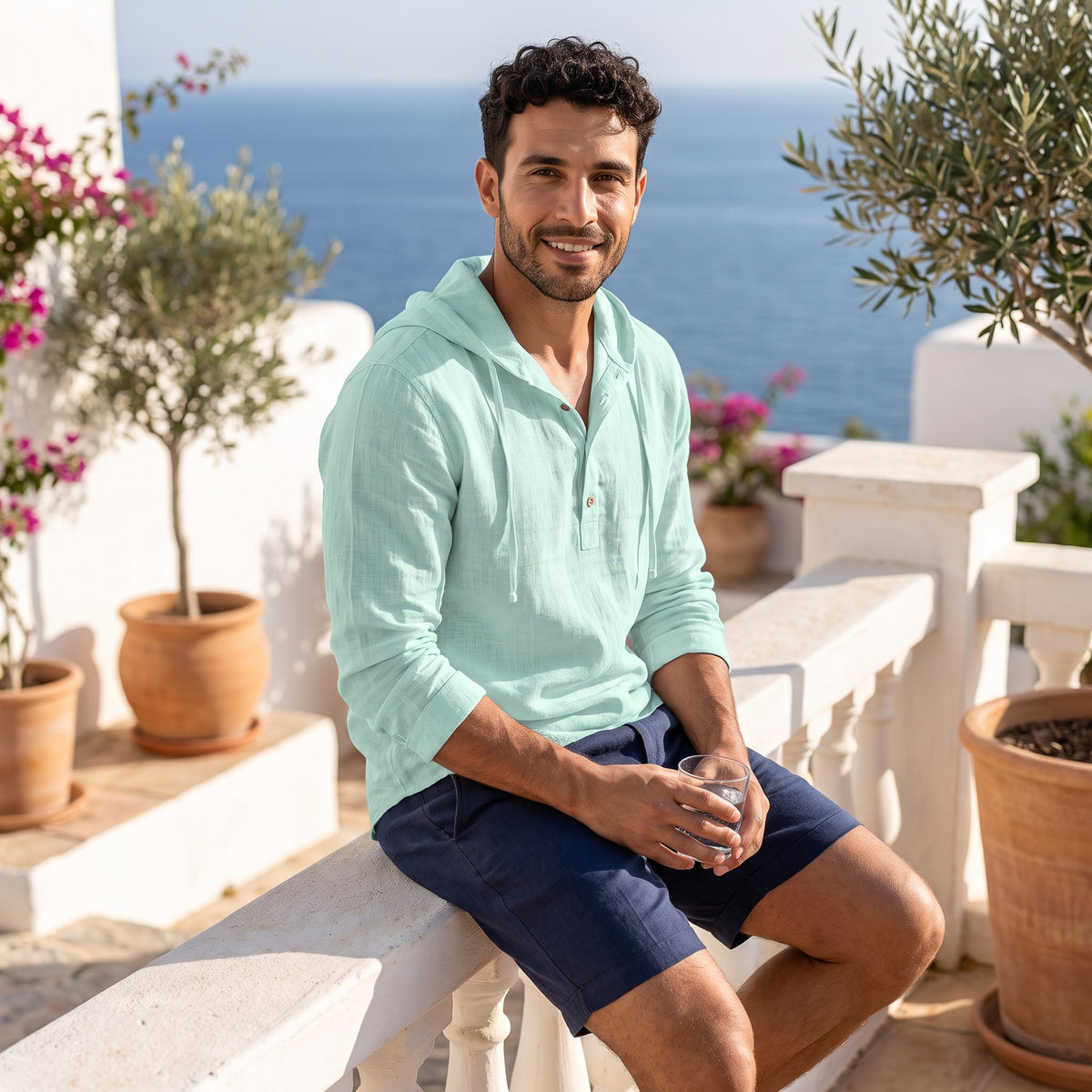 Dario hooded linen henley shirt, Mint Green, worn on a sunlit villa terrace