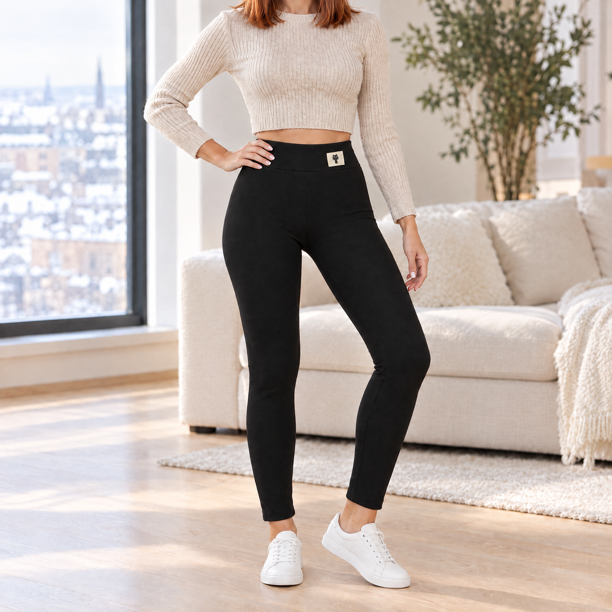 Giulia leggings in black with a cream cat patch, front view