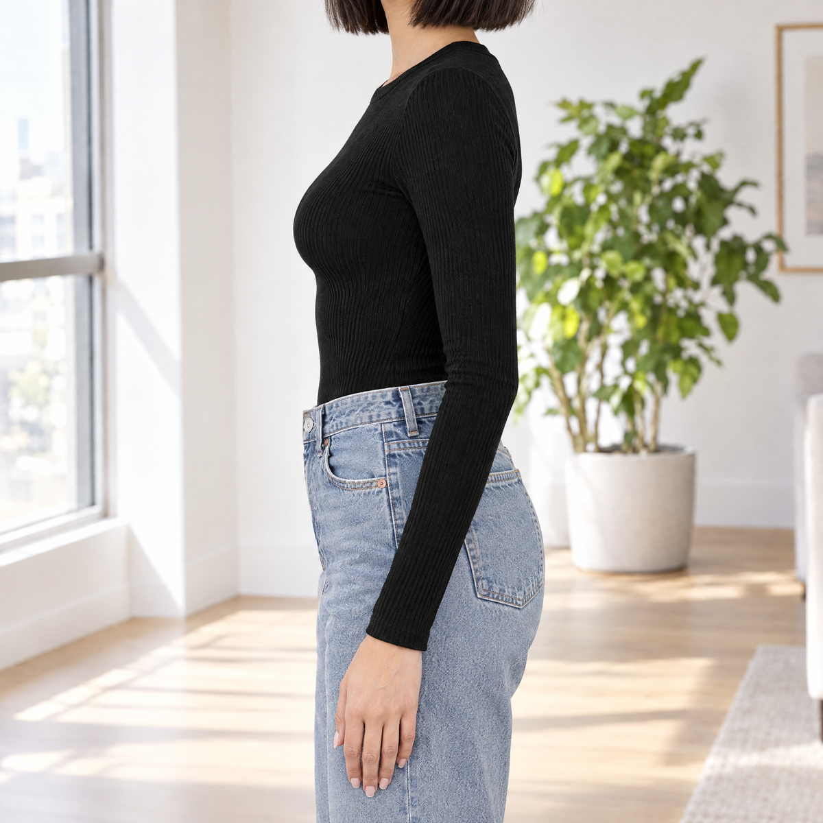 Allegra women's rib knit long sleeve top in black, side view