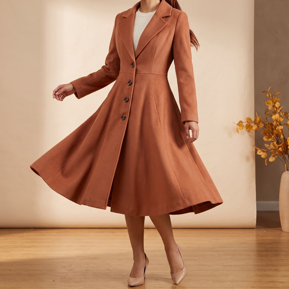 Fiorella coat, Terracotta, full flared skirt in motion