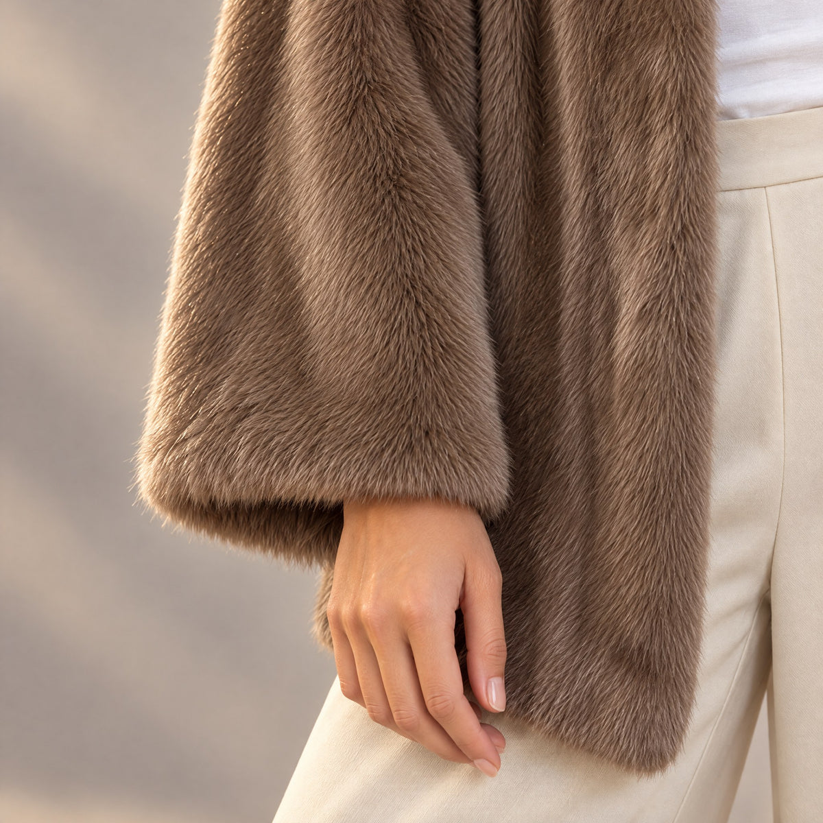 Wide sleeve of the Camille plush fur coat in light coffee