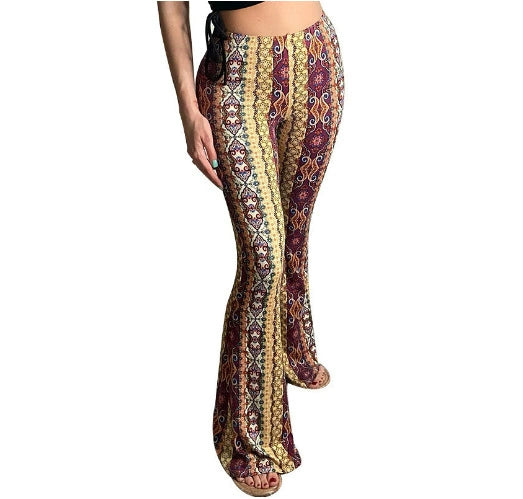 Serena flare pants, Gold Burgundy Tribal, front on model